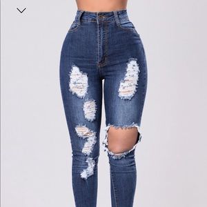 Fashion Nova high waisted distressed jeans